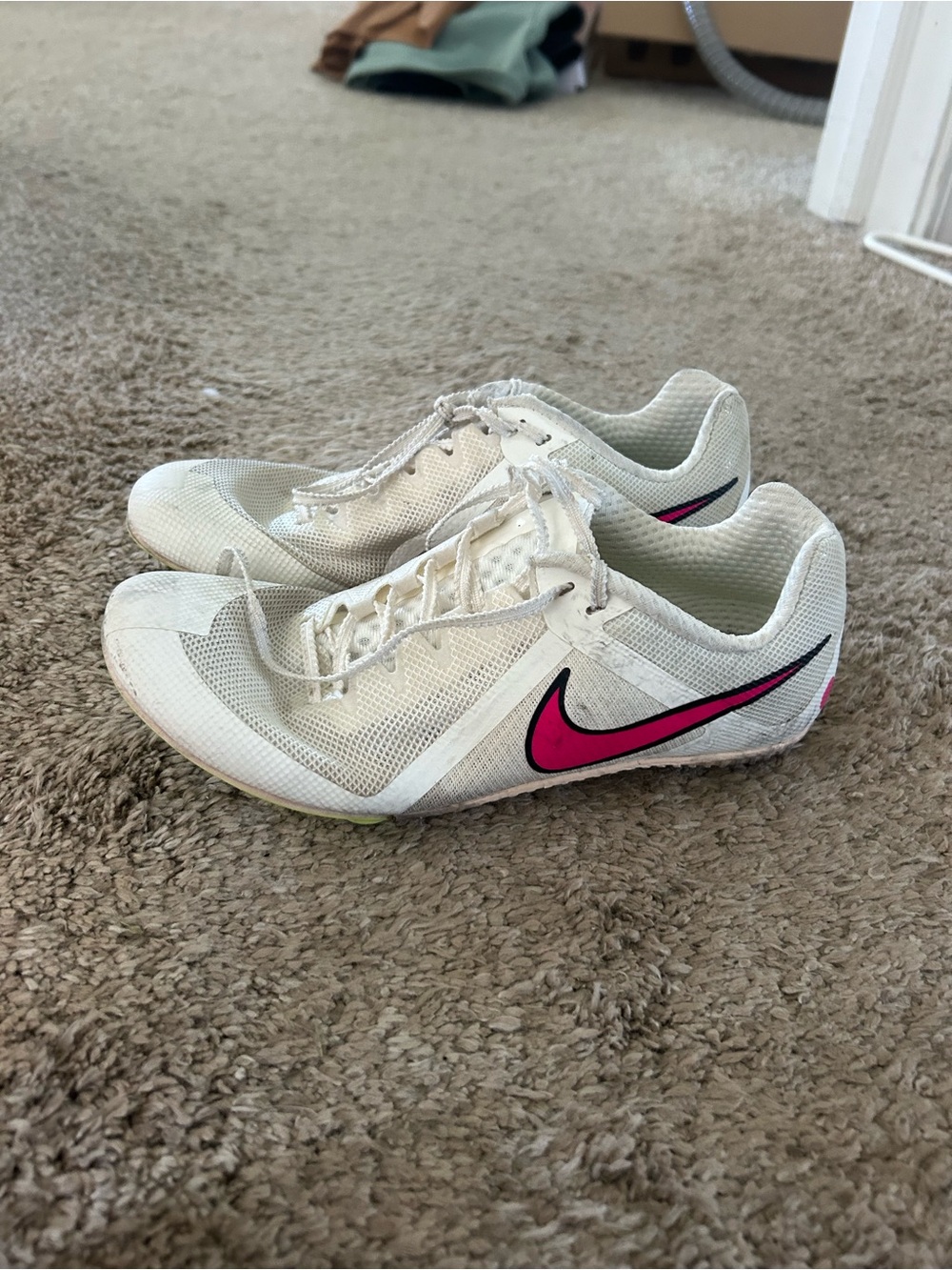 Nike Women’s White Track Spikes with Pink Swoosh Accent